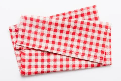 Top view with red empty kitchen napkin isolated on table background. Folded.. Stock Photos