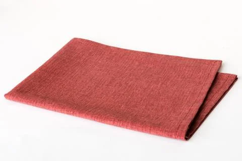 Top view with red empty kitchen napkin isolated on table background. Folded c Stock Photos