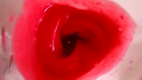 Top view red smoothie berries and fruits mixed in a blender. The concept of a Stock Footage 134729079