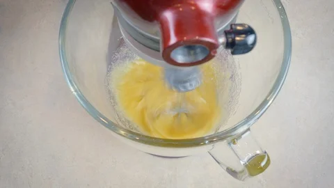 Top View of a Red Stand Mixer Beating Batter in 4k Stock Footage 102526836