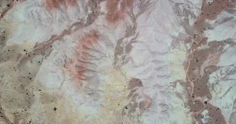 Top view of red, white and yellow eroded dry mountainous landscape 스톡 동영상 103498422