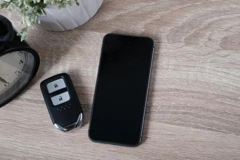 Top view remote keyless with blank screen smart phone Stock Photos