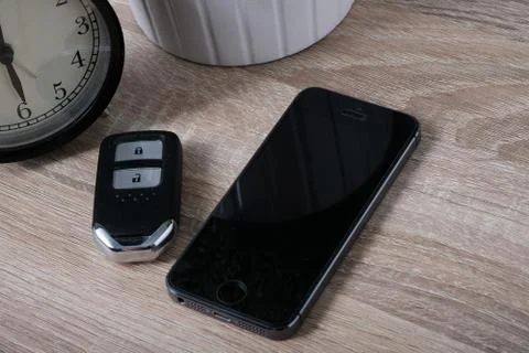 Top view remote keyless with blank screen smartphone Stock Photos