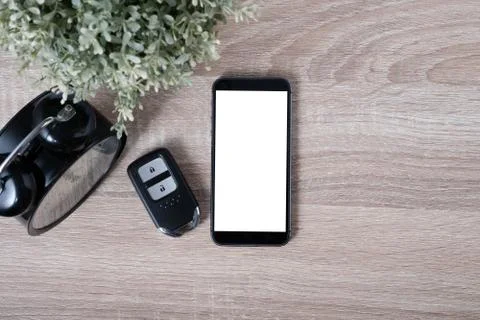 Top view remote keyless with blank screen smartphone Stock Photos