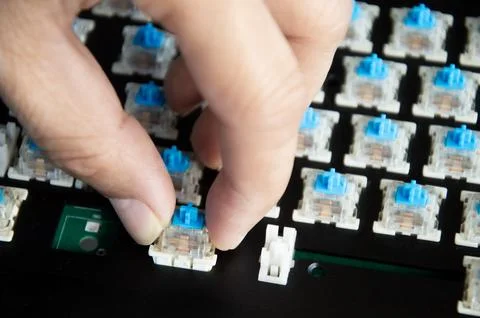 Top view of the replaceable keyboard keycaps. Keyboard repair technician. Stock Photos