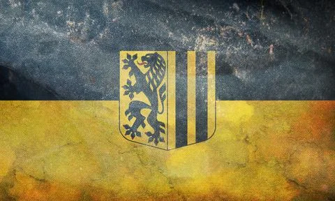 Top view of retro flag of Dresden with grunge texture. Federal Republic of Ge Stock Illustration
