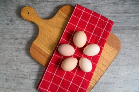 Top view of a ring of cage free brown eggs ready for a recipe Stock Photos