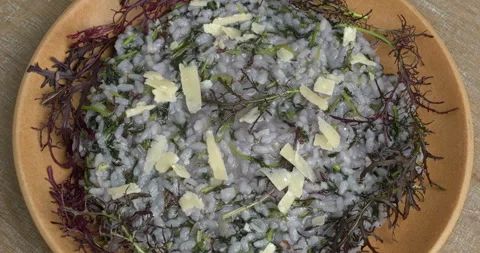 Top view of risotto with mizuna Red Frill variety. Video stock 292313333