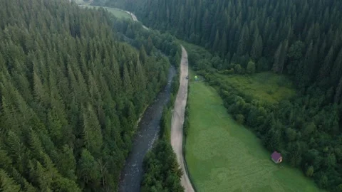 Top view of the river and its parallel road in the Carpathians, countryside in Stock-Footage 146005544
