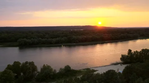 Top view of the river, bird's eye view of the green slopes of the river Stock Footage 226964029