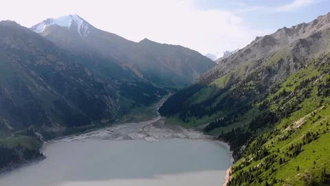 Top view of the river delta flowing into Big Almaty Lake in summer Stock Footage 263573187