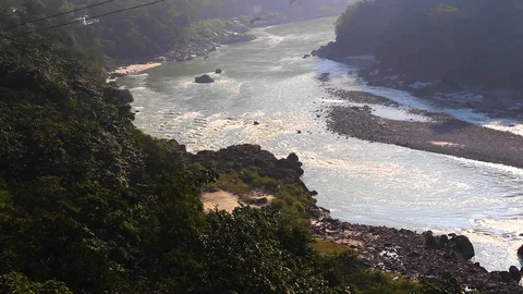 Top view of river Ganges flowing through the mountains in Rishikesh India Stock Footage 105911391