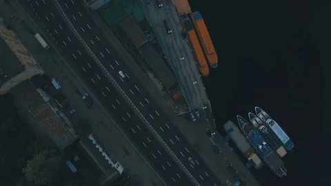 Top view on river port and boats in a European city at sunset aerial Stock Footage 76326892