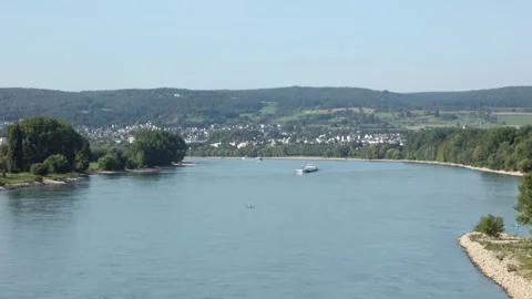 Top view at the river Rhine from the bridge near to Neuwied with cargo ships Stock Footage 257971677