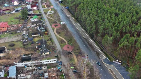 Top view of the road. Aerial view of the destroyed and burnt houses. Video stock 222002998