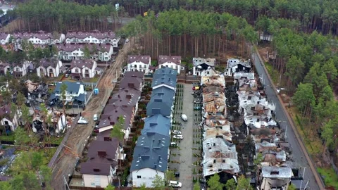 Top view of the road. Aerial view of the destroyed and burnt houses. Stockbeeldmateriaal 222003013