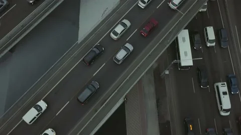 Top view of the road junction and bridges. one of the car lanes is moving slowly Stock Footage 152757195