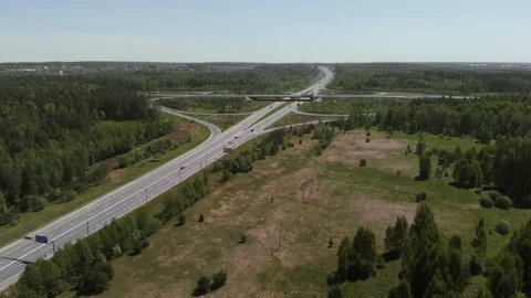 Top view of the road junction. The camera flies up to the road junction. Aerial Stock Footage 108124440
