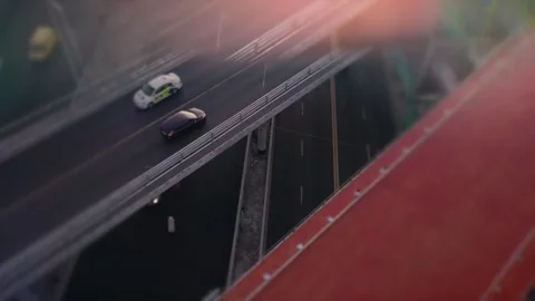 Top view of a road junction, rush hour, video with prism and sun glare effect Stock-Footage 139858696