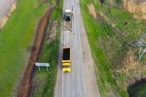 Top view of the road repair. Technics for repair of asphalt. Replacement of a Stock Photos