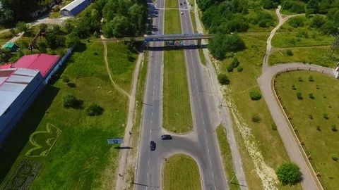 Top view of road. Suburb concept. Ukraine. Aerial drone shooting of driving cars Video stock 105261260