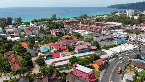 Top view of the roadway and houses, multi-colored roofs, residential buildings Stock Footage 247133053