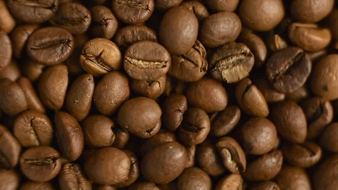 Top view roasted coffee beans close-up. Mixed dark coffee close-up Stock Footage 128362071