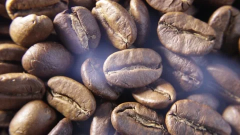Top view roasted coffee beans and smoke. Stock Footage 135174010