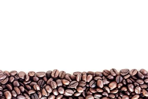 Top view with roasted coffee beans isolated on white table background area fo Fotos de archivo