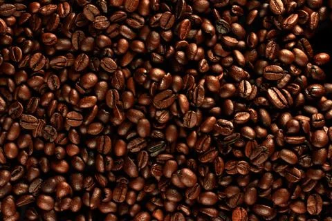Top view of roasted coffee beans for background and texture. Piled of roasted Stock Photos