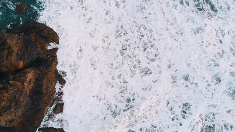 Top view of the rocks in the water, giant waves hit the coast. Benijo Beach Видео 109185694