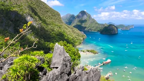Top view of the rocky coast of the philippines. A lot of ships and boats near Stock Footage 239189142