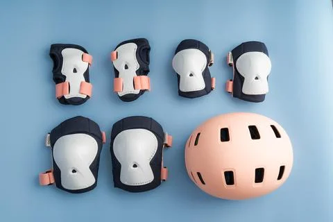 Top view of roller skates protective gear set - knee, elbow and wrist pads and Stock Photos