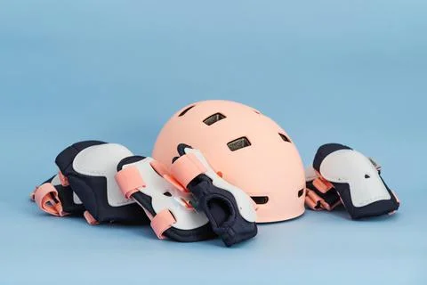 Top view of roller skates protective gear set - knee, elbow and wrist pads and Stock Photos