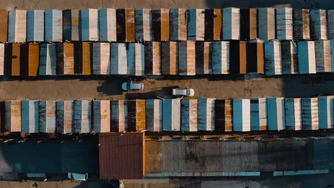 Top view on the roofs of old rusty garages. Garages have a different color. Stock Footage 121417713