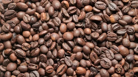 Top view rotating and zoom in of roasted  coffee grains 動画素材 141287344