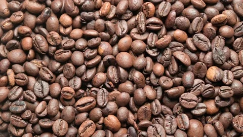 Top view rotating and zoom in of roasted  coffee grains Stock Footage 141287451