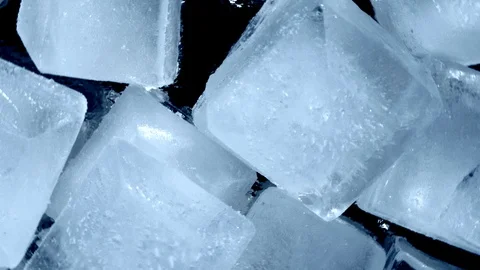 Top  VIew of  Rotating ice cubes. Close up Stock Footage 124471874