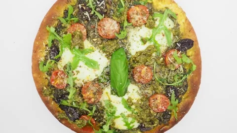 Top View Of A Rotating Mozzarella And Pesto Pizza, London, UK Stock-Footage 134194329
