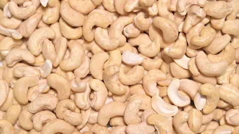 Top view of rotating raw natural cashew nuts Stock Footage 141287210