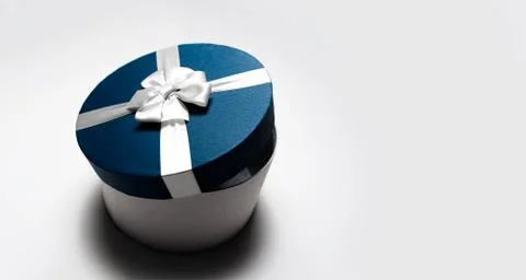 Top view of round half opened gift box isolated on white background with space. Stock Photos