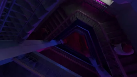Top view of a round shaped staircase under blinking lights of colorful bulbs Stock Footage 148727355
