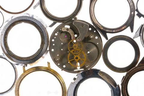 Top view of round silver cases from wristwatches and clockwork with gears. Empty 写真素材