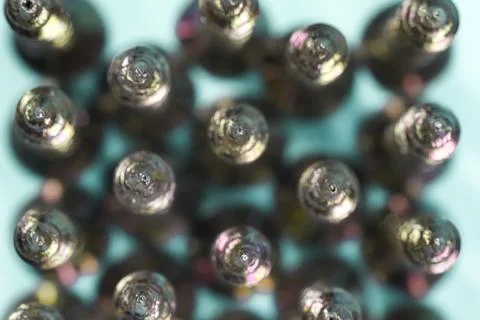 Top view of row of screw tips taken with macro shot Stock Photos