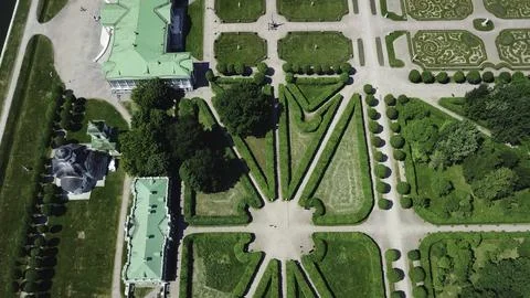 Top view of royal garden with patterns and ancient buildings. Creative. Amazing Fotos de archivo