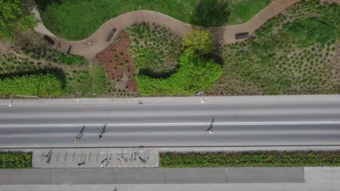 Top view of runners during the marathon in Krakow. Drone tracks athletes Stock Footage 272675896