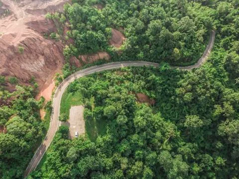 Top View of Rural Road, Path through the green forest and countryside of Thai Stock Photos