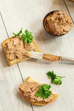 Top view of rustic pate sandwiches on white table Stock Photos