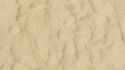 Top view of sand texture. Shot on camera on slide dolly Stock Footage 132600843