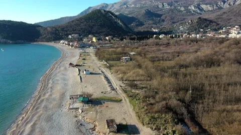 Top view of the sandy beach of the Adriatic Sea in Montenegro Stock Footage 153383451